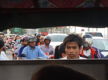 The view from a back window of a tuk-tuk in Phnom Penh